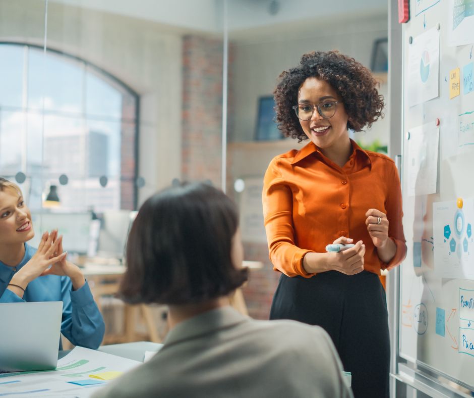 young woman leading meeting